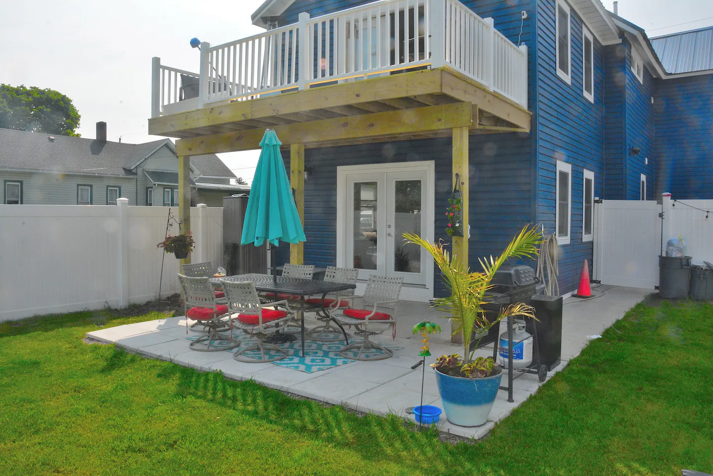 rear of home showing grilling area